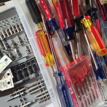 A box of screwdrivers, including jewellers and houshold, then a collection of bits including torx and hex.